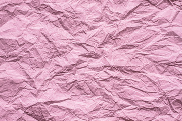 Fototapeta premium Abstract design wallpaper, pink color crumpled paper texture 
