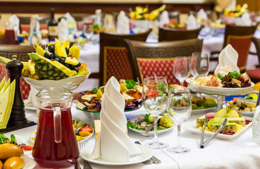 Banquet in the restaurant. Various delicacies, snacks and drinks at the gala event. Catering.