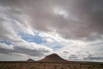 Fototapeta na wymiar Desert Butte on a cloudy day