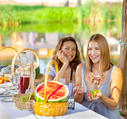 beautiful laughing women at a festive table