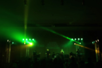 People in the party blur at night.