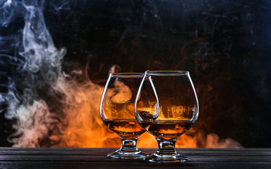 luxurious and expensive French brandy in a glass - obrazy, fototapety, plakaty