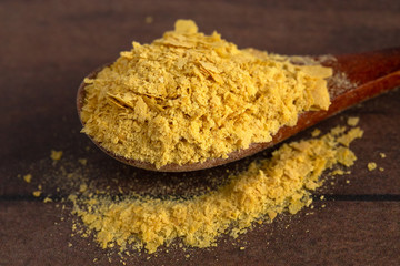 Flakes of Yellow Nutritional Yeast a Cheese Substitute and Seasoning for Vegan Diets