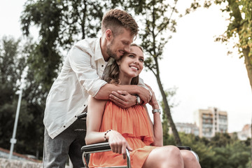 Handsome male person expressing love to his girl