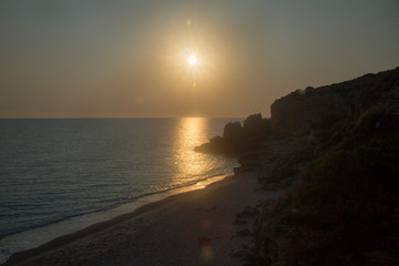 Fototapeta premium Blue sunset and rocky beach in Drymades Dhermi Albania