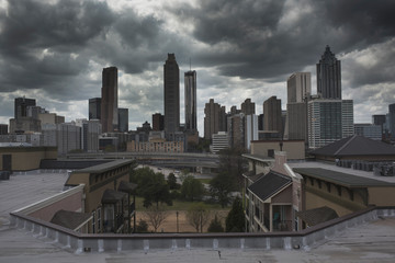 Fototapeta na wymiar Atlanta Skyline on Dark Dwith Cloudsay 