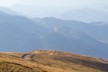 Atop the mountain Tomorr in Albania overlooking road in landscape mode