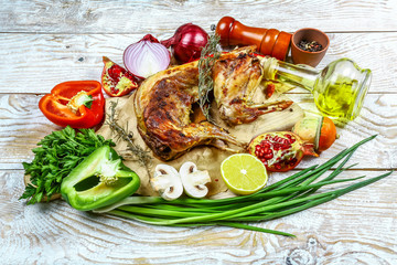 Roasted rabbit with sour cream sauce and fresh vegetables. Top view. cooking recipe, background, banner