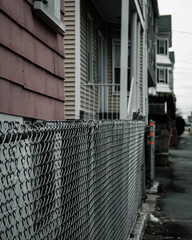 Chain link fence in front of a house