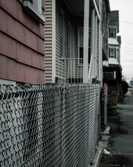 Fototapeta premium Chain link fence in front of a house