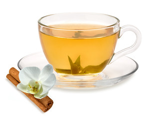 Green or herbal tea in cup with leaves isolated  on white background including clipping path