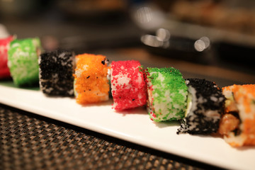 Plate with Uramaki Sushi rolls