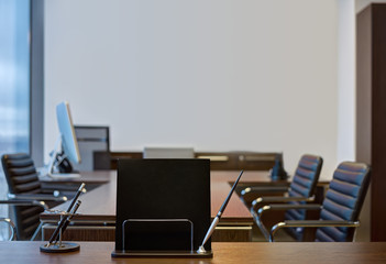 Black notebuk with pen