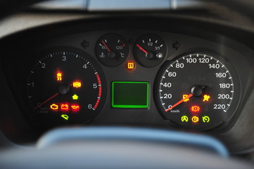 the instrument panel in the car, the speed dial on the dashboard