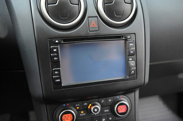 controls near the steering wheel in a modern car