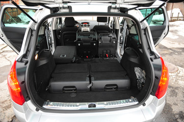 New car inside. Clean car interior. Black back seats transformer in sedan. Car cleaning theme.