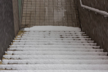 snow on staircase walking