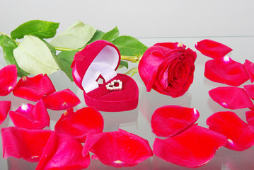 Valentine's gift. Rose, petals and jewelry box