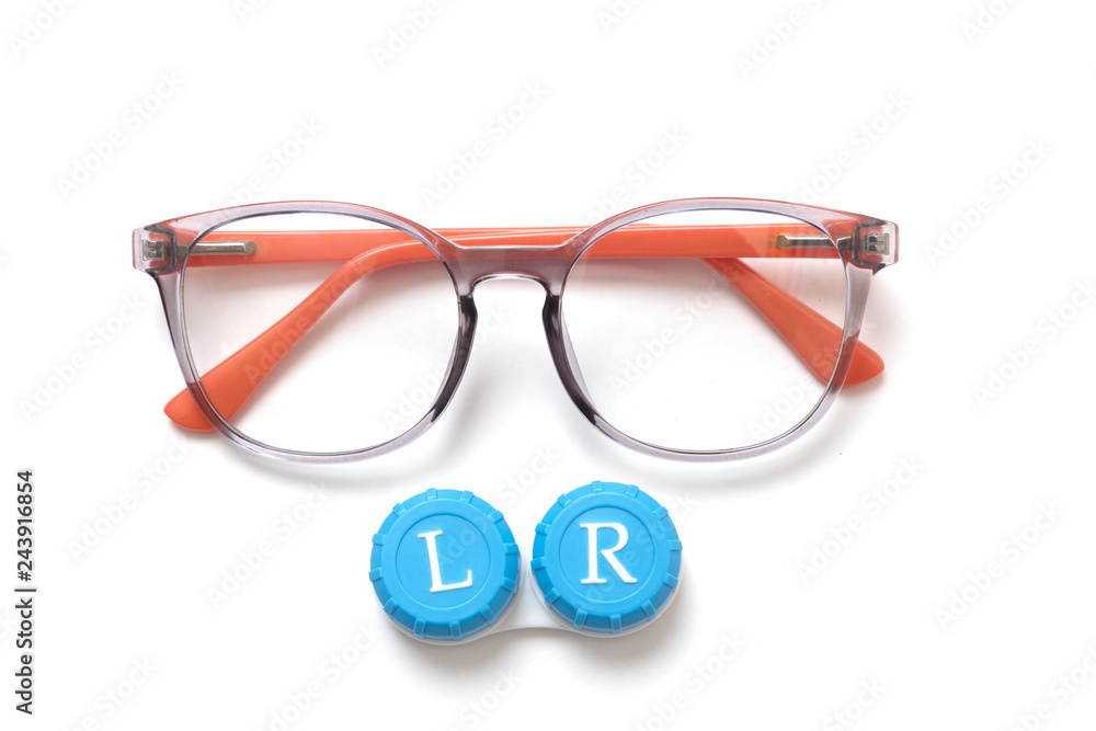 Wall mural Eyeglass frames and a container with contact lenses. Isolated