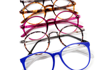 Different eyeglass frames on white background. Isolated