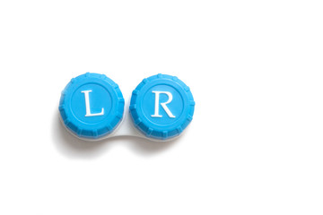 Contact lens container with blue lids. Isolated