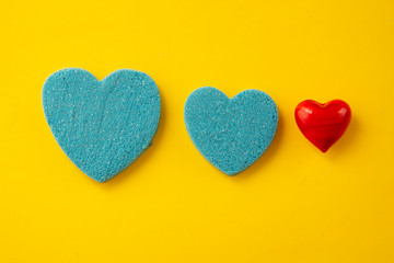 Beautiful blue and red hearts. Greeting ard for Valentine s day. Kinetic sand heart shape, over...