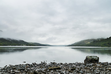 Cloudy day on a gray lake