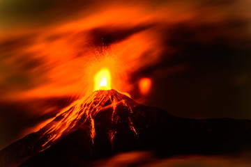 Lava spurts from erupting Fuego volcano in Guatemala