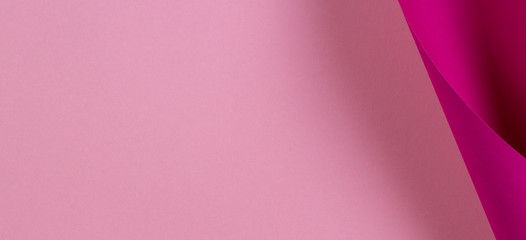 Abstract geometric shape pink color paper background