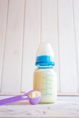 baby milk formula and bottle on a white background. Food for children