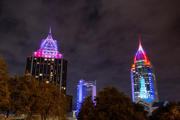High rise buildings in the downtown city during a cloudy dark night. Taken in Mobile, Alabama,...