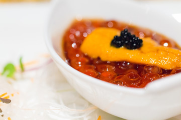 closeup of caviar with uni, Japanese cuisine starter
