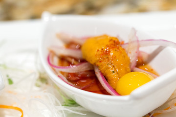 closeup of uni with egg, Japanese cuisine starter