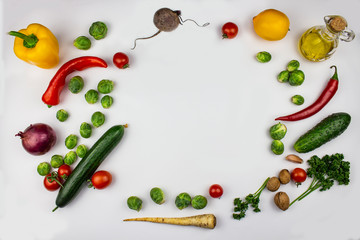 seasonal vegetables - broccoli, bell peppers, tomatoes, onions, garlic with spices and herbs. Ingredients to prepare vegetable side dish. Healthy vegetarian food concept. Vegetables background. isolat