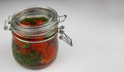 A variety of canned products in glass jars - tomatoes, cucumbers, Brussels sprouts, broccoli. Preservation of vegetables and fruits. canning. Preservation of the harvest. isolate