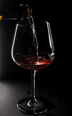 Obraz na płótnie Canvas Glass of red champagne. Sparkling wine