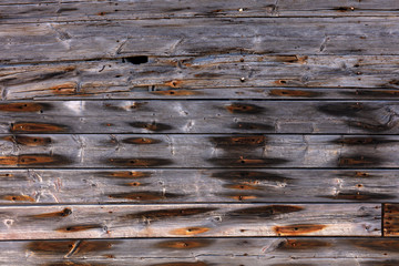 Naklejka premium exterior wooden wall with rusty nails