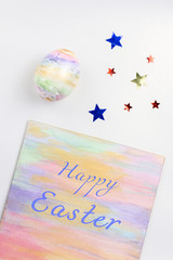 Pastel colorful Easter eggs and decorations, copy space. Happy Easter greeting card