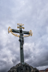 Charles bridge. Prague. Statue of crucified Christ on the bridge