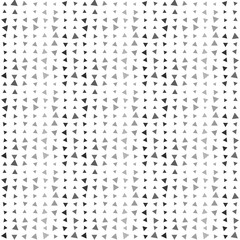 Abstract seamless pattern background with multi-colored varied triangles.