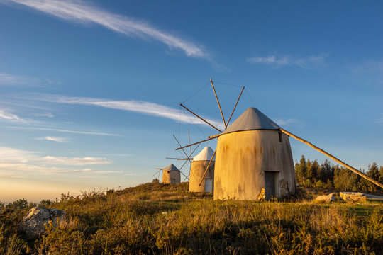 Landscape of Old Historical Windmills, Moinhos de Gavinhos, at Sunset in Penacova Portugal