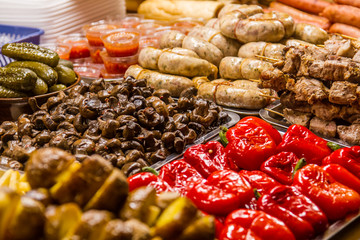 Festive street food laid out on the table to buy multi-colored and tasty appetizing