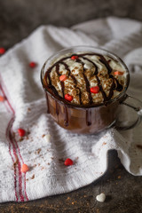 Fancy Hot Chocolate with Whipped Cream on Dark Background