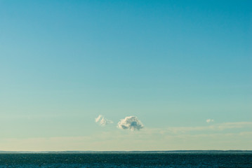 Small clouds drifting across Buzzards Bay