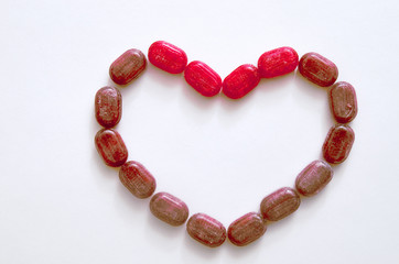 St. Valentine's Day. Red heart made of lollipops. Love.