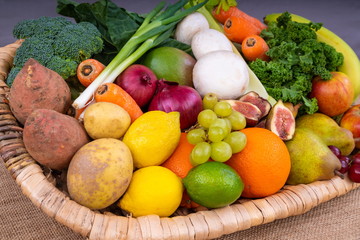 Basket of Fruit and Vegetables. Basket of fresh fruit and vegetables, promoting a healthy high fibre diet.