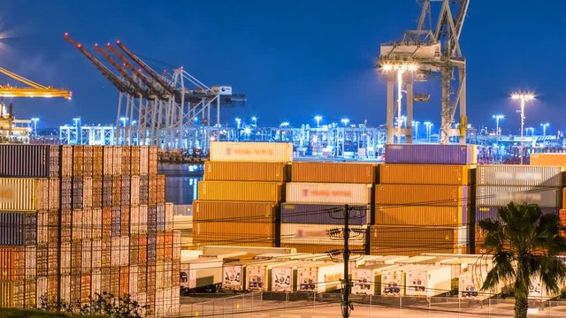 Timelapse Of Container Yard At Port Of Los Angeles At Night -Pan Left-