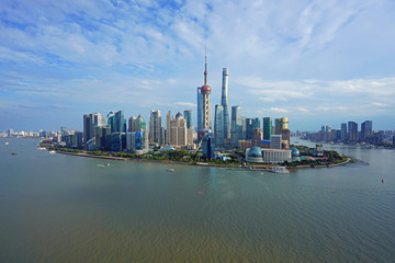 Naklejka premium Day view of the modern Pudong skyline seen from the Bund in Shanghai, China