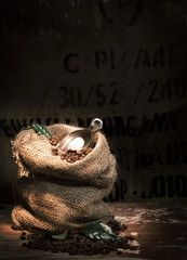 Rustic burlap bag full of roasted coffee beans
