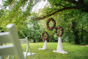 Wedding flower wreath in the garden.